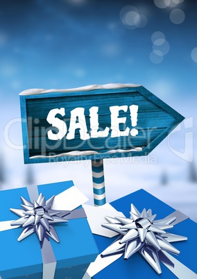 Sale text and gifts with Wooden signpost in Christmas Winter landscape