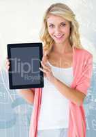 Woman holding tablet with information background