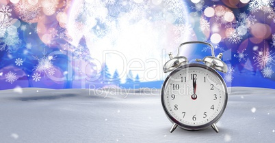 Midnight clock in Christmas Winter landscape