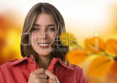 Woman's face in forest with leaves