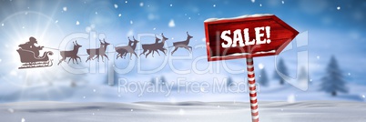 Sale text on Wooden signpost in Christmas Winter landscape and Santa's sleigh and reindeer's