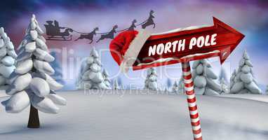 North Poe text on Wooden signpost in Christmas Winter landscape and Santa's sleigh and reindeer's