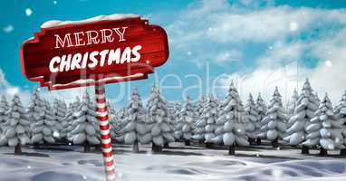 Merry Christmas on Wooden signpost in Christmas Winter landscape