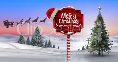 Merry Christmas text on Wooden signpost in Christmas Winter landscape with Christmas tree and Santa'