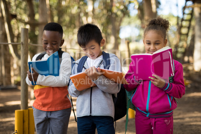 Kids studying in park