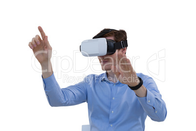Male executive using virtual reality headset