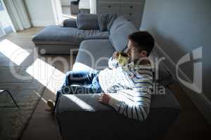 Man having coffee in the living room