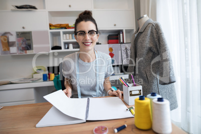 Fashion designer working at desk