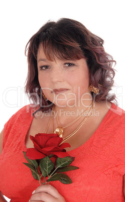 Portrait of big woman with rose