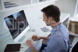 Man working on person computer