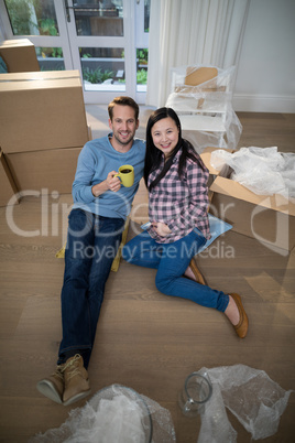 Couple relaxing together at their new home