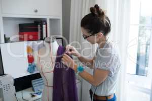 Fashion designer designing a fabric textile