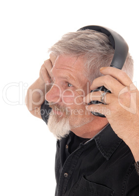 Middle age man listening to music