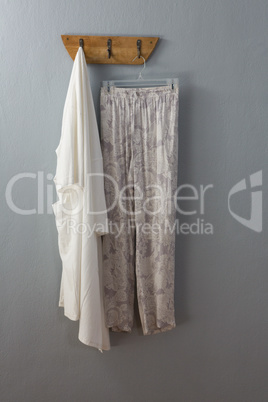 Cotton pant and top hanging on hook