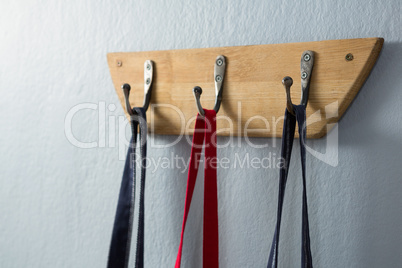 Various aprons hanging on hook