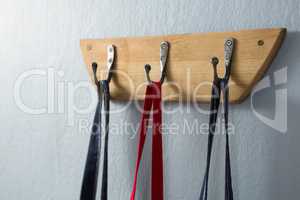 Various aprons hanging on hook