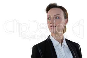 Businesswoman smiling against white background