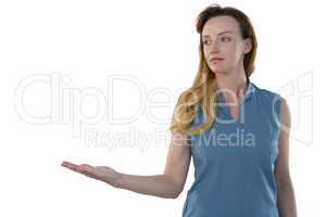 Female executive pretending to hold an invisible object