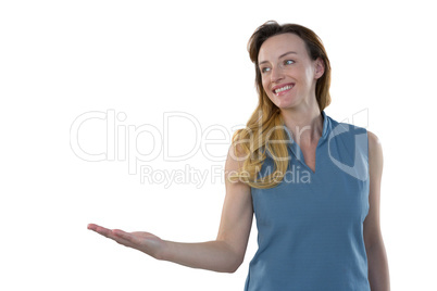 Female executive pretending to hold an invisible object