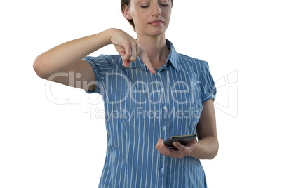Female executive trying to touch the mobile phone