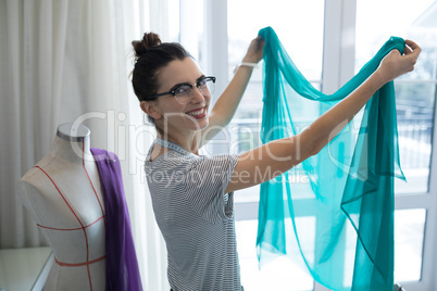 Fashion designer designing a fabric textile