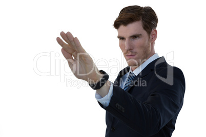 Businessman pretending to use an invisible screen