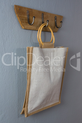 Handbag hanging on hook