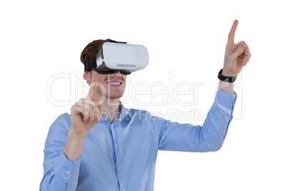 Male executive using virtual reality headset