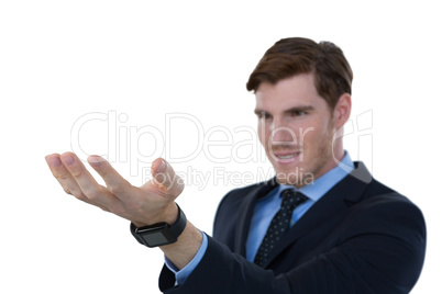 Businessman pretending to hold an invisible object