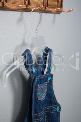 Dungaree hanging on hook