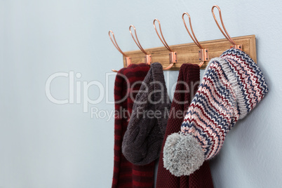 Warm clothings hanging on hook