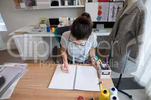 Fashion designer working at desk