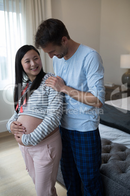 Man and woman interacting with each other in bedroom