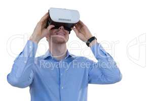 Male executive using virtual reality headset