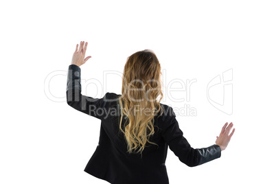 Businesswoman pretending use an invisible screen