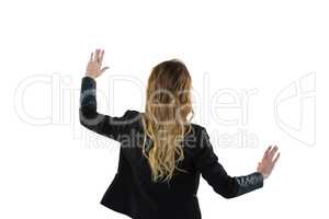 Businesswoman pretending use an invisible screen