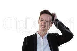 Businesswoman standing against white background