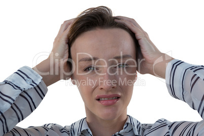 Female executive standing against white background