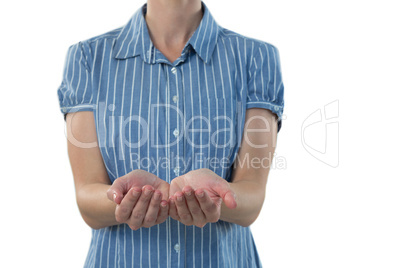 Female executive pretending to hold an invisible object