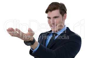 Businessman pretending to hold an invisible object