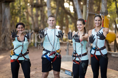 Portrait friends wearing protective gloves