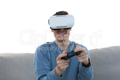Man playing video game with virtual reality headset
