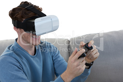 Man playing video game with virtual reality headset