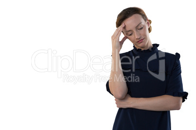 Female executive standing against white background