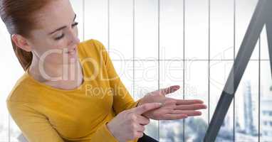 Businesswoman with hand palm open in city office