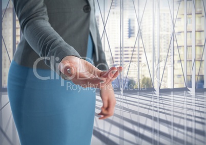 Businesswoman with hand palm open in city office