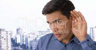 Businessman listening in city