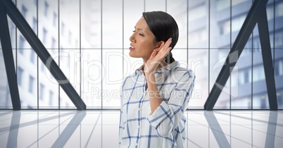 Businesswoman listening in city office