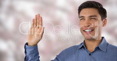 Businessman swearing honesty with hand in nature