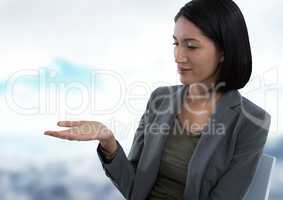 Businesswoman with hand palm open in city office